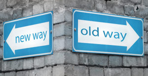 Road signs saying old way new way