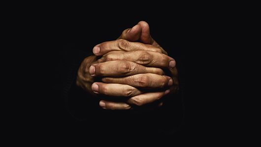 hands folded in prayer