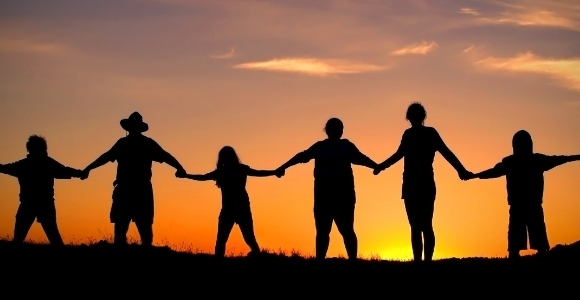 community holding hands