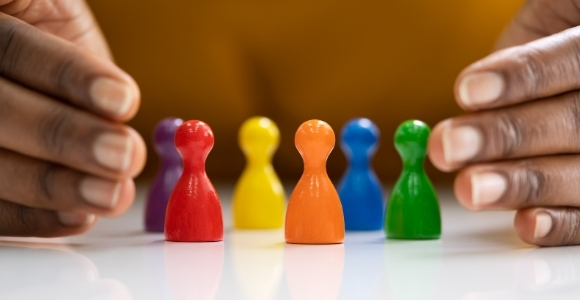 inclusive hands and difference color pegs