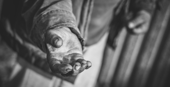 black and white picture of hand to illustrate article