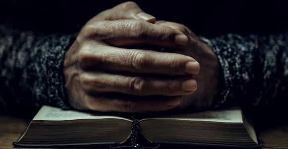 hands folded in prayer